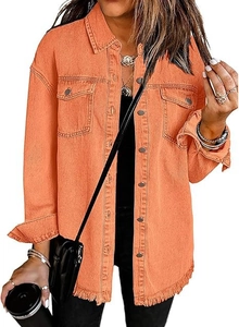 Detail of orange denim jacket featuring buttoned flap pockets and a frayed fringe hemline