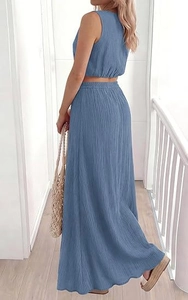 Detail view of the blue cotton two-piece set featuring a cropped top and long maxi skirt