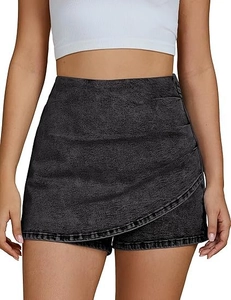 Macro shot of acid wash denim skort with asymmetric wrap and side pleats detailing