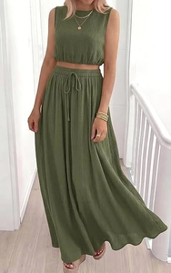 Detailed texture of olive green puckered fabric on sleeveless crop top and maxi skirt set