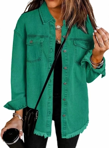 Detail of green frayed hem denim jacket featuring dual chest pockets and button-down style