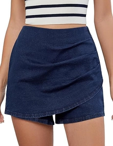 Detailed view of high-waist asymmetric denim skort with side ruffles in dark blue
