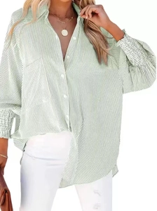Detail of green striped shirt with smocked elastic cuffs and elegant lantern sleeves
