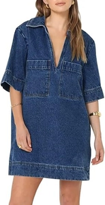 Detail of V-neckline and large square pockets on this dark blue denim mini dress