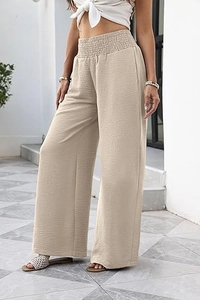 Detailaufnahme der beigen High-Waist-Hose mit weitem Bein und elastischem Bunddesign