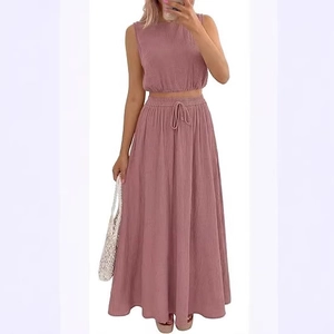 Women's 2-piece pink crop top and high-waist maxi skirt set with textured fabric