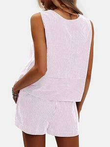 Detail view of pink striped sleeveless top and shorts set with breathable fabric texture