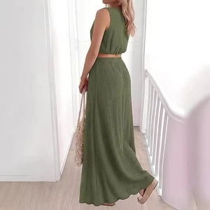 Women's summer green two-piece set featuring a sleeveless crop top and pleated maxi skirt