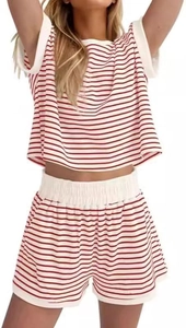 Detail of red and white striped summer lounge set showing fabric texture and white hems