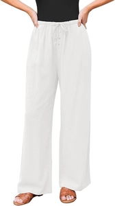 Detail van witte wijde broek met hoge taille, trekkoord en decoratieve knopen