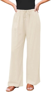 Detail van de hoge elastische taille met trekkoord en knopen op de beige wijde broek