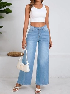 Detail view of light blue wide-leg jeans with central seam and high-waist design
