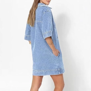 Light blue wash denim shirt dress with V-neck, short sleeves and practical side pockets