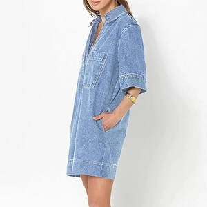 Women's light blue denim mini dress with V-neck, short sleeves and chest pockets