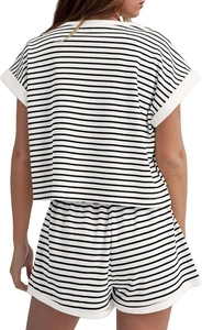 Detail of knitted striped two-piece summer set showing back view and white piping trim