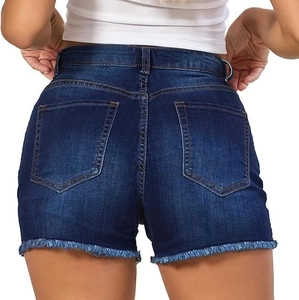 Detail view of denim shorts showing classic back pockets and stylish frayed hem edges