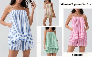 Detailed view of women summer two-piece striped outfits with smocked tops and shorts