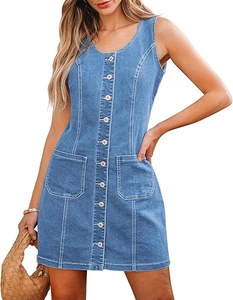 Detail of light blue denim sleeveless dress featuring button-down front and large pockets