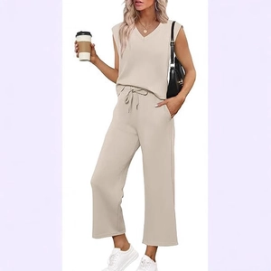 Women's two-piece set featuring a V-neck sleeveless top and high-waisted wide-leg trousers