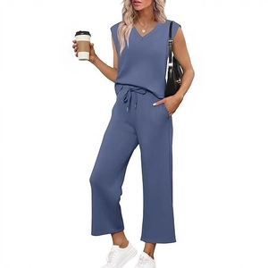 Women's V-neck sleeveless top and high-waisted wide-leg pants set in elegant grey blue