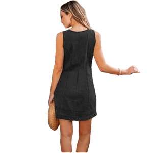 Detail of black sleeveless denim dress with slimming seams and mini length cut