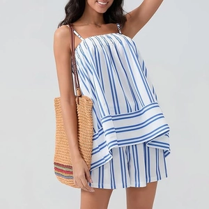 Detail of blue and white striped summer camisole and shorts set with smocked chest texture