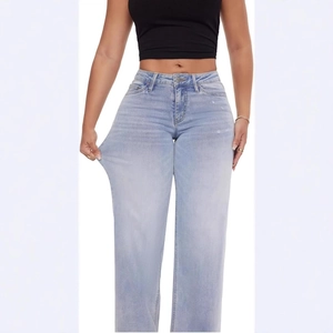 Jean bleu clair taille haute jambe droite pour femme avec stretch élastique