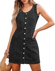 Close-up of sleeveless denim dress featuring metallic buttons and large patch pockets
