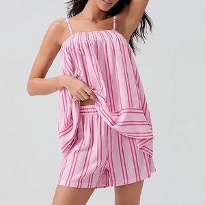 Detail of pink striped camisole and shorts set with smocked neckline and soft fabric