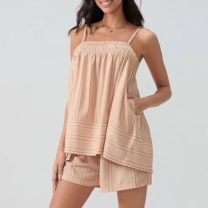 Detailed view of the sleeveless striped camisole top and matching loose lounge shorts