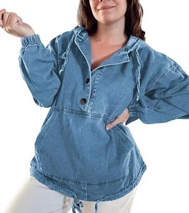 Close-up of blue denim hoodie jacket featuring buttoned neckline and drawstring hem detail