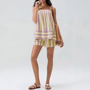 Detail of yellow striped camisole and shorts set with smocked chest for summer
