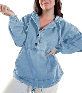 Detail of light blue denim hoodie with buttoned neckline and large kangaroo pocket