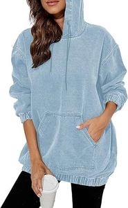 Detail of light blue oversized hoodie with washed texture, kangaroo pocket, and drawstrings