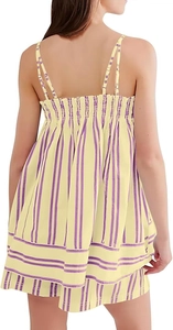 Detail view of the elastic smocked back and purple vertical stripes on a yellow summer set