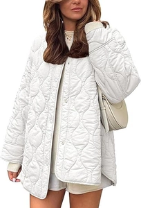 Detail of white quilted jacket showing wavy stitching texture and press-stud closure