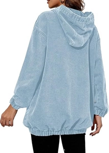 Back view of light blue oversized hoodie with washed denim texture and dropped shoulders