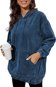 Detail of vintage denim blue hoodie featuring a front kangaroo pocket and drawstring hood