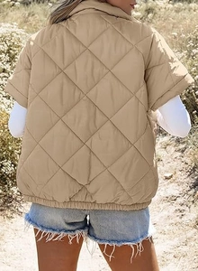 Detail of light khaki quilted jacket with diamond pattern and casual zip-up pocket design