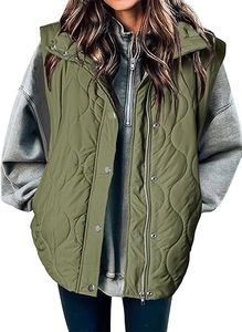Close-up of olive green quilted vest featuring high collar with zipper and snap buttons