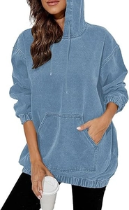 Detail of acid-wash denim hoodie featuring drop shoulders and a large kangaroo pocket