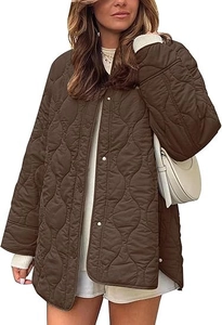 Detail shot of the side slit and wave quilting on this loose brown cotton jacket