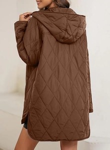 Macro view of brown quilted hooded jacket with diamond pattern and loose fit design