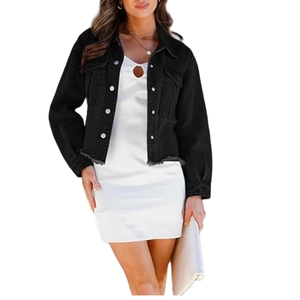Detail of cropped black denim jacket with frayed hem and raw edges for women