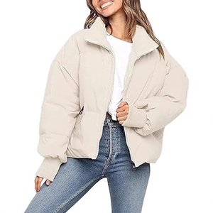 Women's cream puffer jacket featuring a warm stand collar and zip-up quilted design