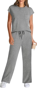Detail of grey lounge set featuring short sleeve pocket top and drawstring wide-leg pants