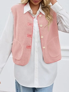 Detailed texture of pink sherpa vest featuring wooden buttons and front patch pockets