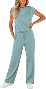 Close-up of women's short sleeve top with pocket and loose drawstring wide leg trousers