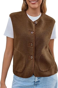 Detail of dark brown faux shearling vest featuring four buttons and large round pockets