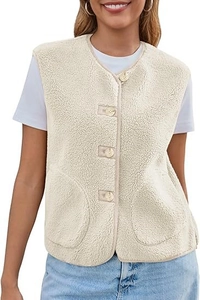 Detailed view of cream faux shearling vest featuring round neck and four-button closure